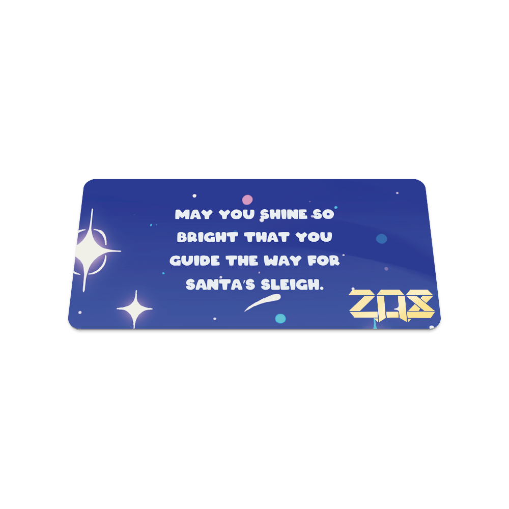 Back of the card is blue with stars and says "May you shine so bright that you guide way for Santa's sleigh"