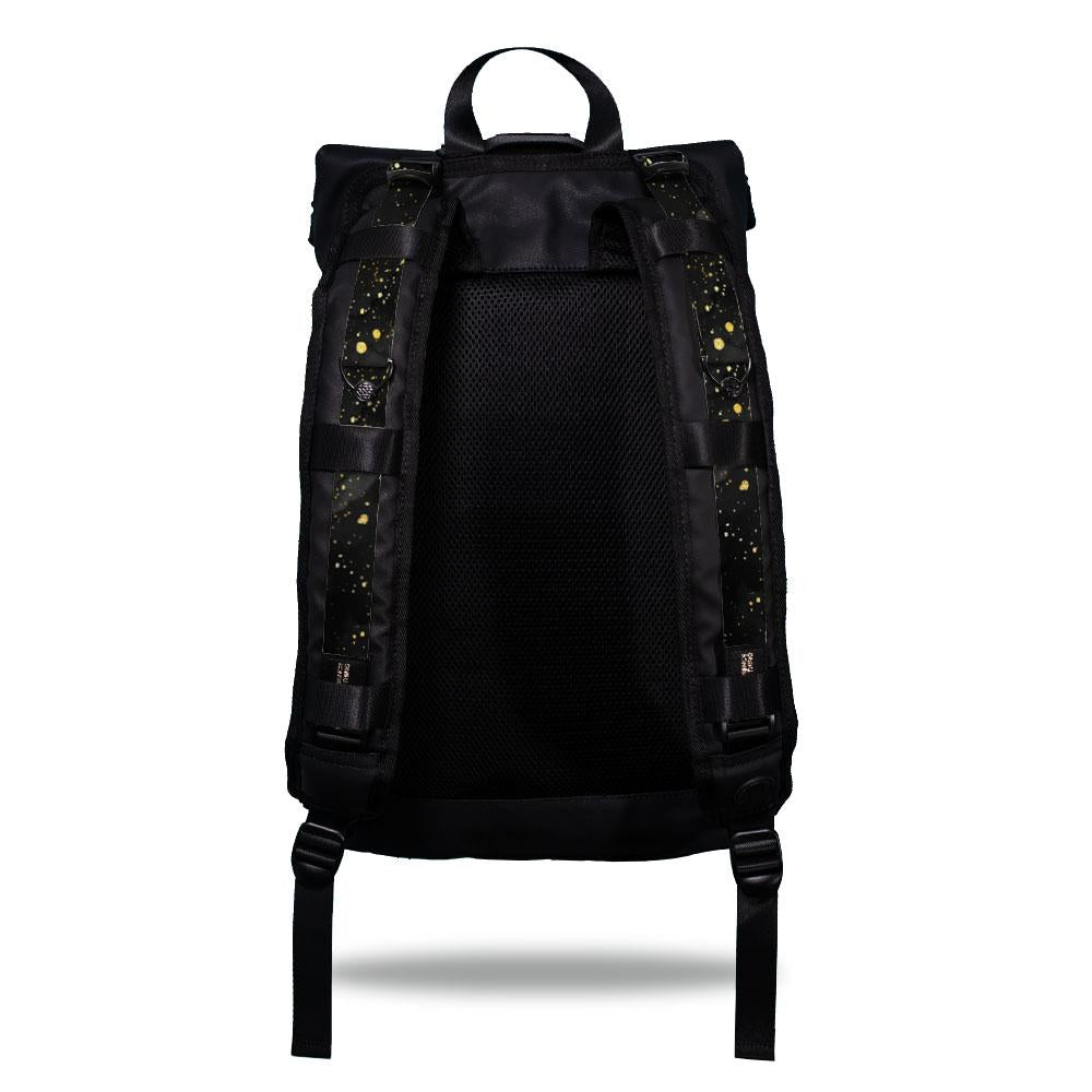 Product image show the back of an Imperial backpack with two should straps showing with interchangeable straps. The tension strap the item that is for sale on this page and is called Miadas and is mainly solid black and grey in the background with gold colored paint speckles on the front of the design