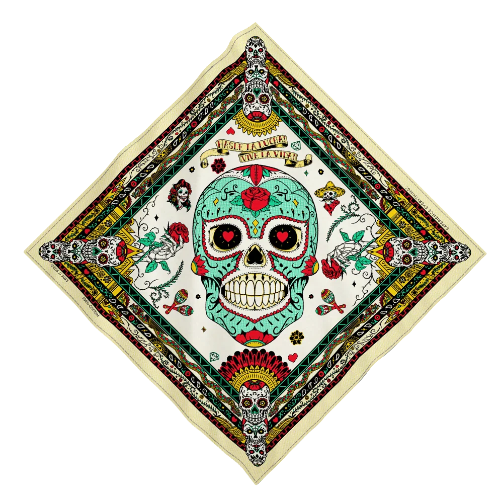 A multicolored bandana with a central skull design surrounded by floral patterns and other decorative elements on a white background.