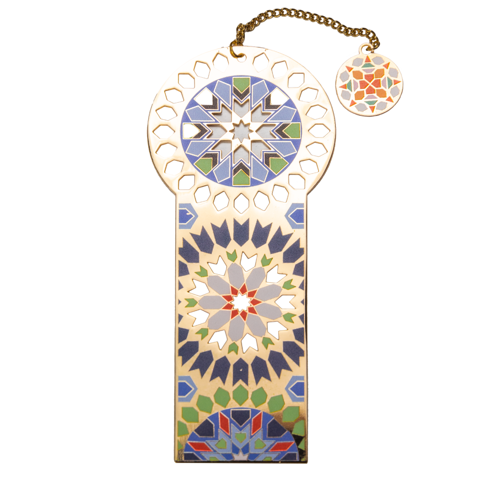 Copper plated bookmark with a colorful mandala design .