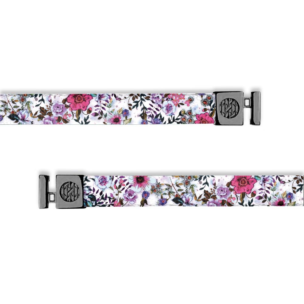 Flat hoodie string. Design is a white background with pink and purple garden/flowers. Inside reads "Have Faith" and aglets are black.