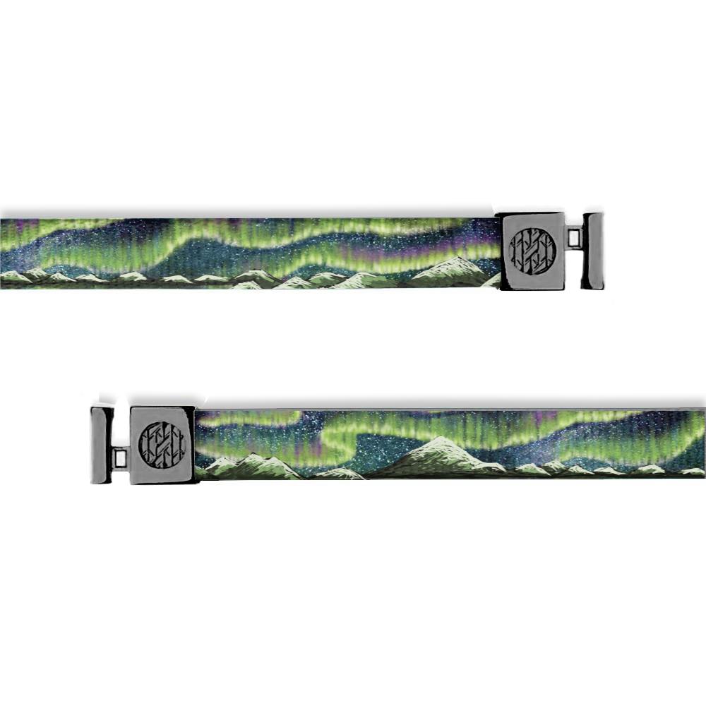 Flat hoodie string. Design is the Aurora lights with greens and purples. Inside reads "Live in the Moment" and aglets are black.