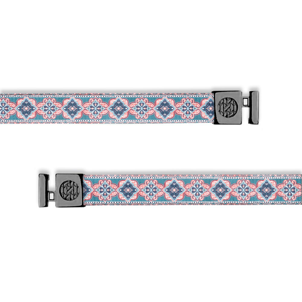 Flat hoodie string. Design is very intricate and vintage looking. Colors are pinks, blue and teal. Inside reads "Stay Humble, Stay Kind" and the aglets are black.