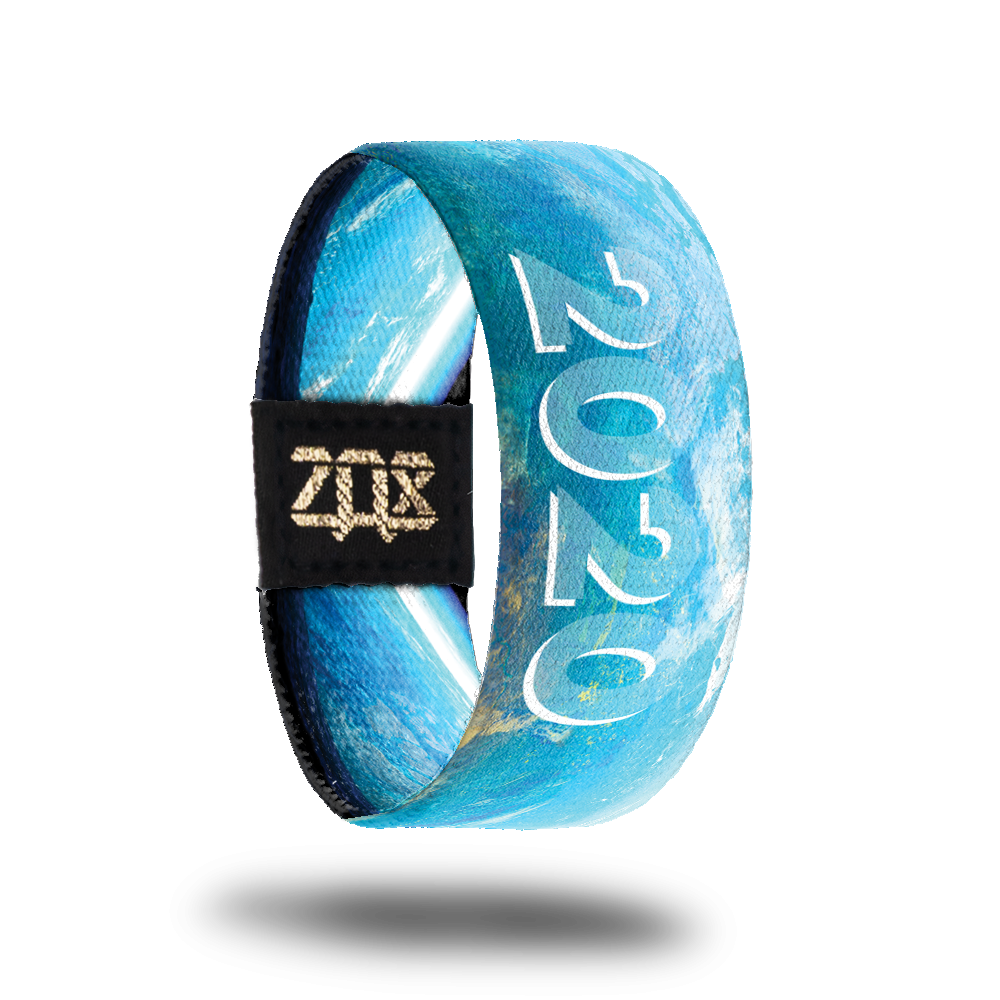 Product photo of the inside of 2020: blue toned design displaying the view of earth from outer space with '2020' text