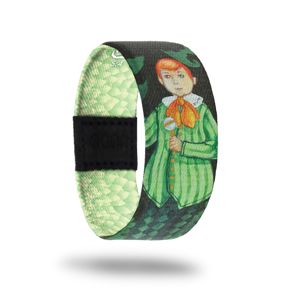 Assume Nothing-Sold Out-ZOX - This item is sold out and will not be restocked. Green strap with light green diamond shapes and leaves. Has a red-headed boy in all green and says "dum" on his collar. Inspired by Alice in Wonderland's Tweedle Dee and Tweedle Dum. This is part of the Wonderland mini collection. 