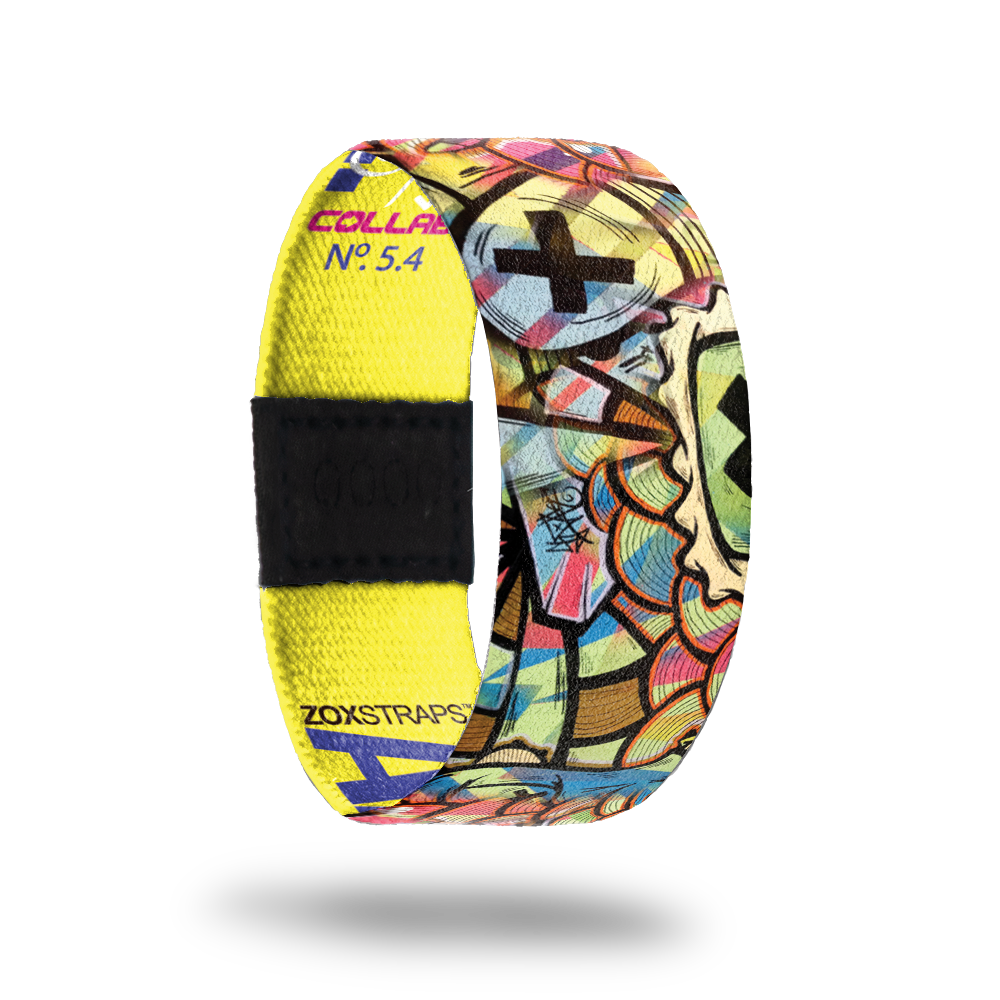 Adventure-Sold Out-ZOX - This item is sold out and will not be restocked. Brightly colored abstract designs with black Xs all over. The inside is yellow and says Adventure. 