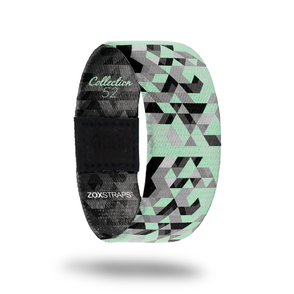Alpha-Sold Out-ZOX - This item is sold out and will not be restocked. Teal, grey and black prism design. Inside is the same and reads Alpha. 