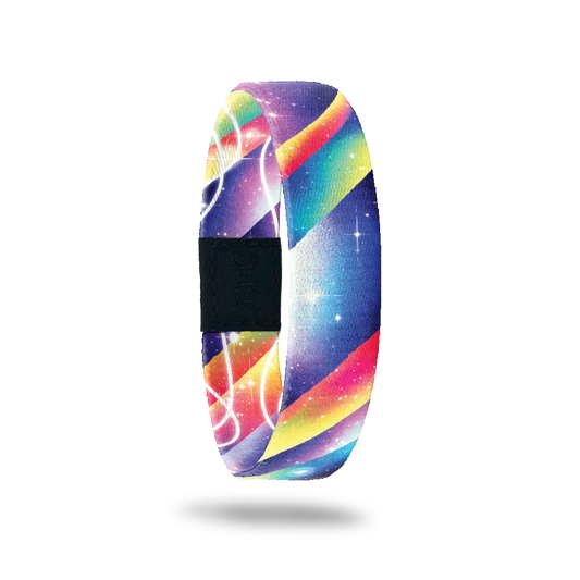 This is a wristband with purple, red, yellow and green gradient rays that go diagonally across the band. There are small white stars and the inside reads Among The Stars.This item is reversible and can be worn with the design or the message on the outside. 