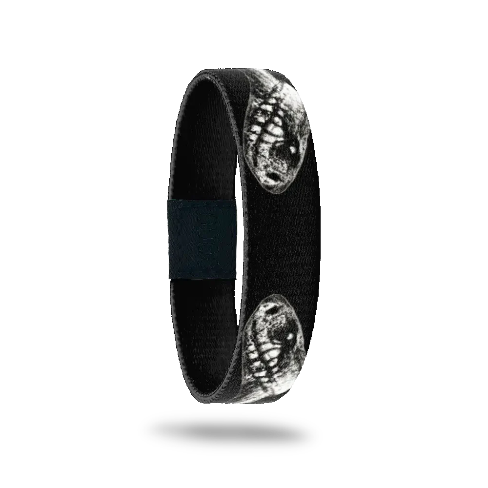 Black ZOX with two snakes looking at each other. Inside is solid black and reads Amore Fati. 
