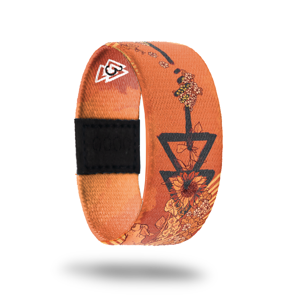 Animal-Sold Out-ZOX - This item is sold out and will not be restocked. Burnt orange with various sunflowers all over and black arrows. Inside is solid orange and says Animal. 