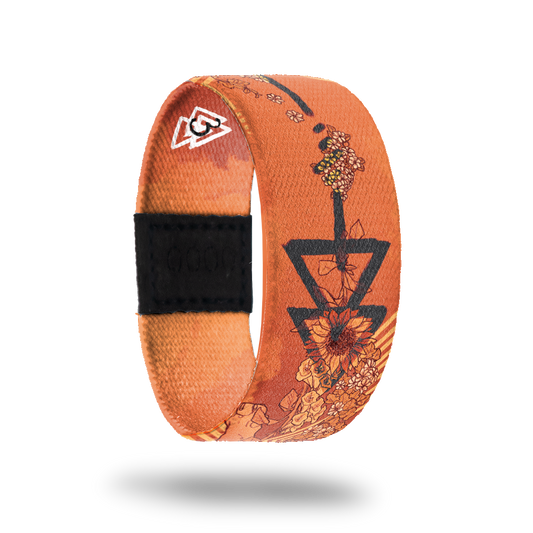Animal-Sold Out-ZOX - This item is sold out and will not be restocked. Burnt orange with various sunflowers all over and black arrows. Inside is solid orange and says Animal. 