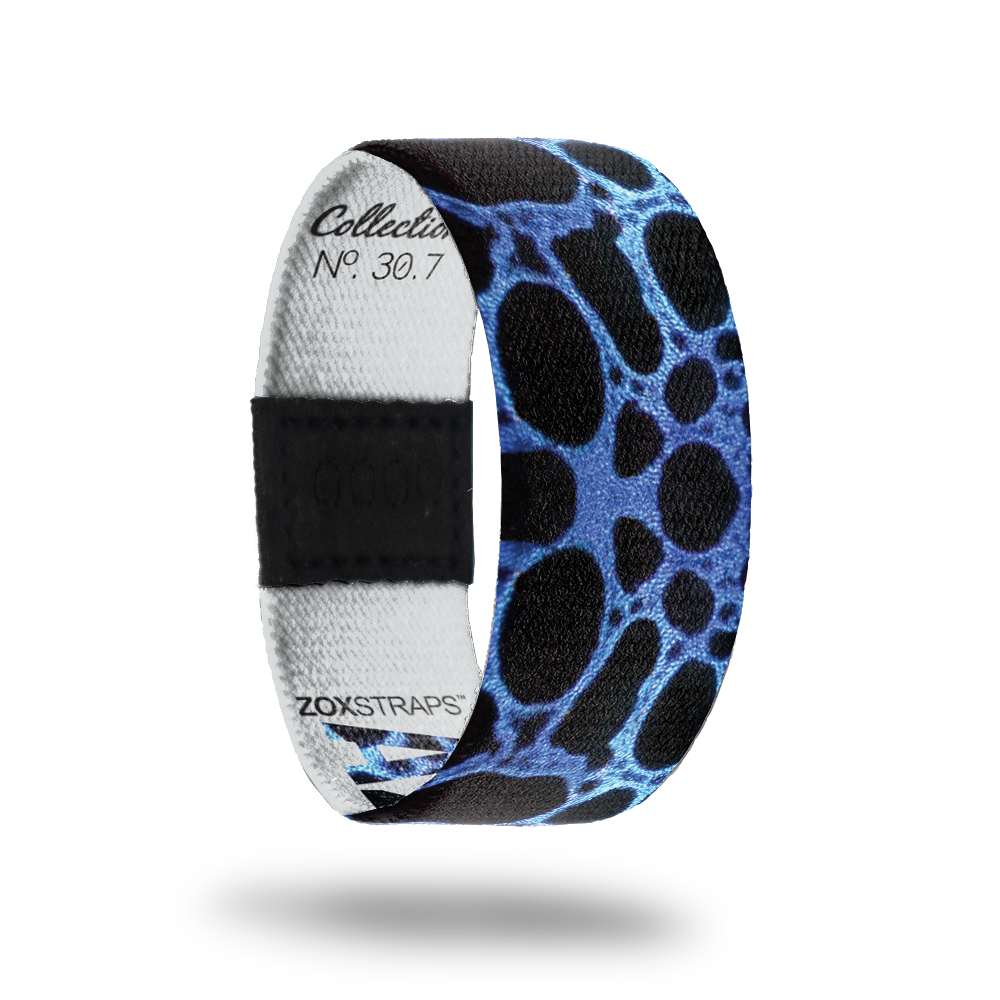 Azureus-Sold Out-ZOX - This item is sold out and will not be restocked. Black strap with blue circular design all over. Inside is solid white and says Azureus.