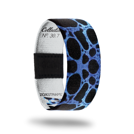 Azureus-Sold Out-ZOX - This item is sold out and will not be restocked. Black strap with blue circular design all over. Inside is solid white and says Azureus.