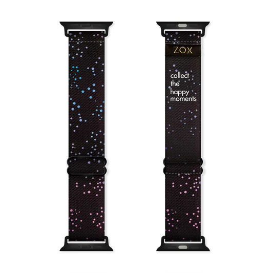 This is a watchband and not reversible. The design is black with gradient colored small dots all over. The inside is the same and says Collect The Happy Moments. 