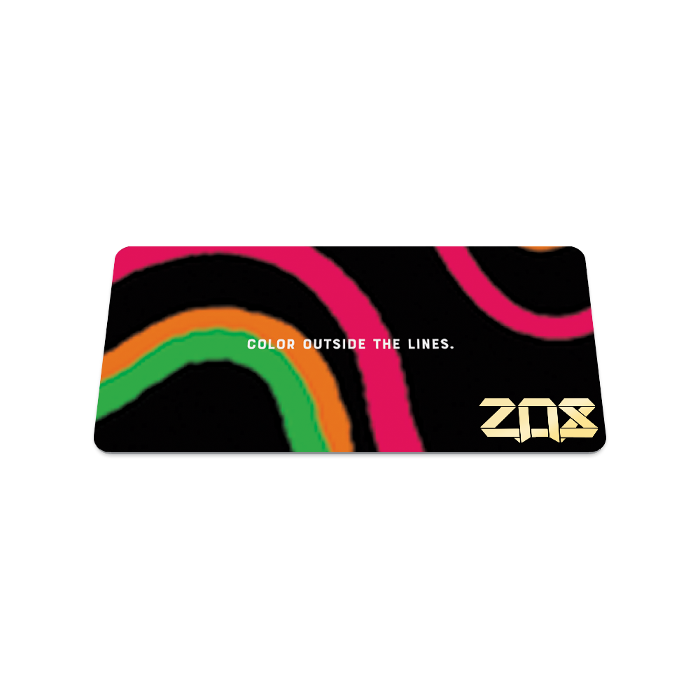 Back collector's card image of Dare to Be Different: black background with pink, orange and green in zoomed in irregular shapes throughout the single and text ‘Color outside the lines’