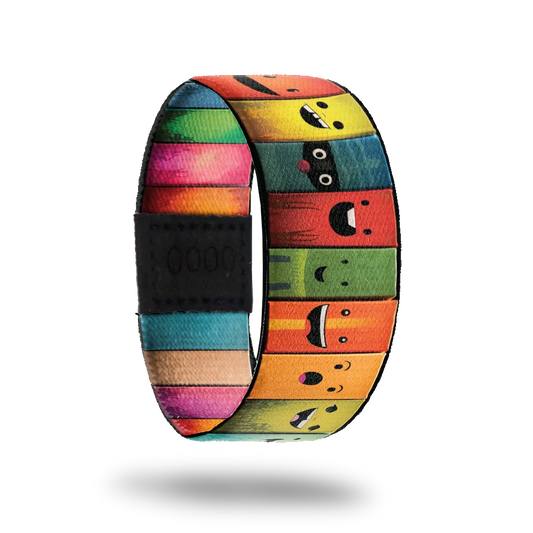 ZOX strap with colorful books along the entire design. Each book has a cute smiley face and the inside reads Don't Judge a Book By It's Cover. 