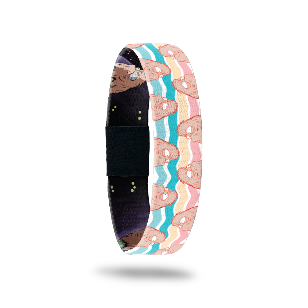 Product photo of the outside of 2020 - Day 31 - Edna Egg-Legs: teal, turquoise, yellow and peach striped design with repeating furry, peach monsters