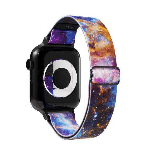 Watchband with a spacey design of purple, gold, yellow, white and blue. White stars all over. Inside reads Fighter. Check size guide for compatible watches.