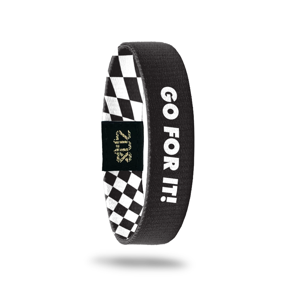 Inside Design of Go For It: simple black ground with bold white overlaying text ‘Go For It!’