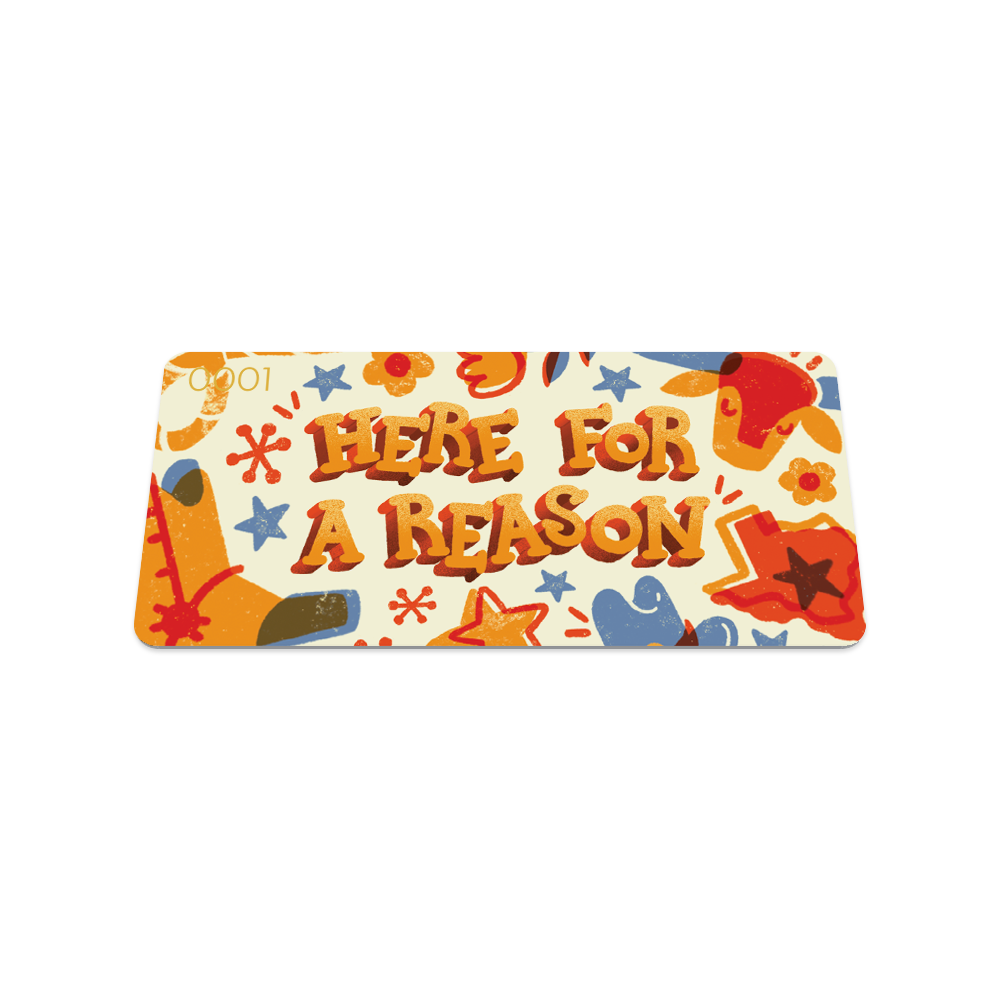 Front collector's card image of Here For a Reason: light creme/yellow design with orange and blue cacti, cowboy boots, ropes, cowboy hats, and longhorns with orange text 'Here For a Reason'