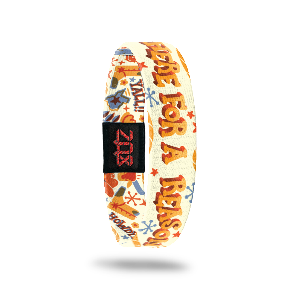 Inside Design of Here For a Reason: light creme/yellow design with orange and blue cacti, cowboy boots, ropes, cowboy hats, and longhorns with orange text 'Here For a Reason'