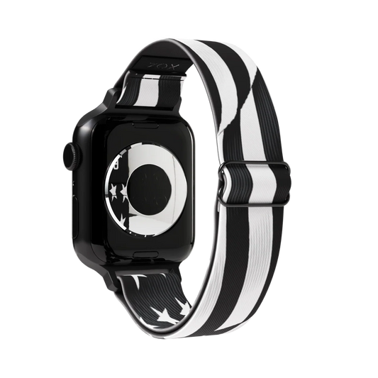 Watchband with a black base and an American flag in all white- stripes and stars. The inside is the same and says I Got Your Six. Check size guide for compatible watches.