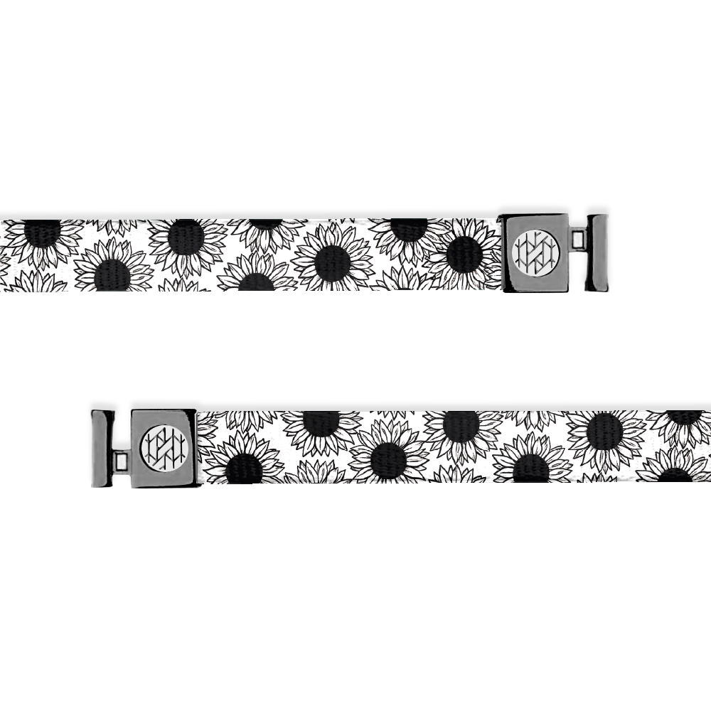 Outside is white with black daisies all over and grey aglets. 