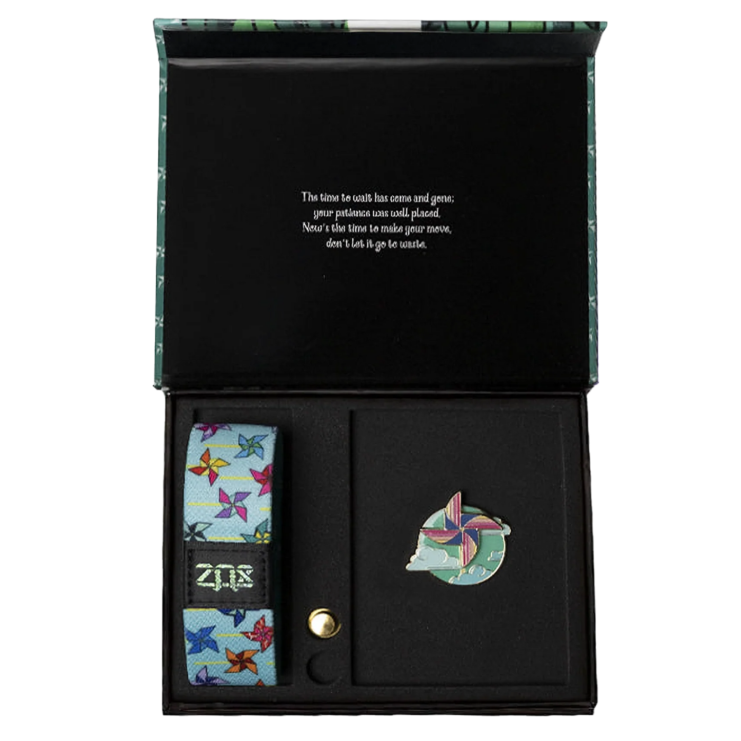 Outside is light blue with multicolored pinwheels all over. Comes with a matching collector's box and lapel pin. 