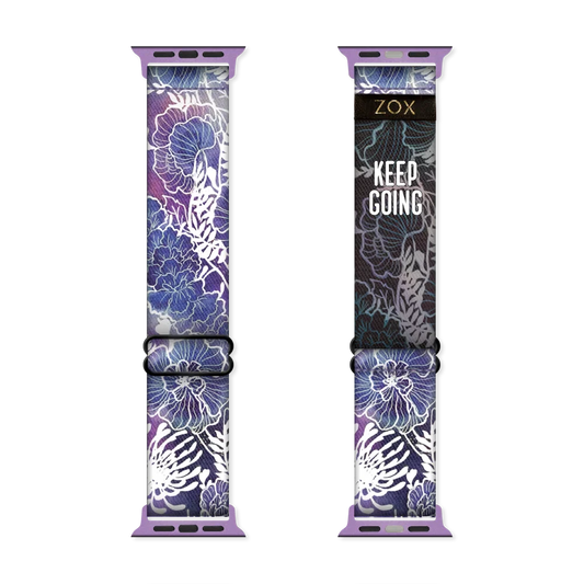 Watchband with various purple flowers, trimmed in white lines. The inside is the same and says Keep Going. Check size guide for compatible watches. 