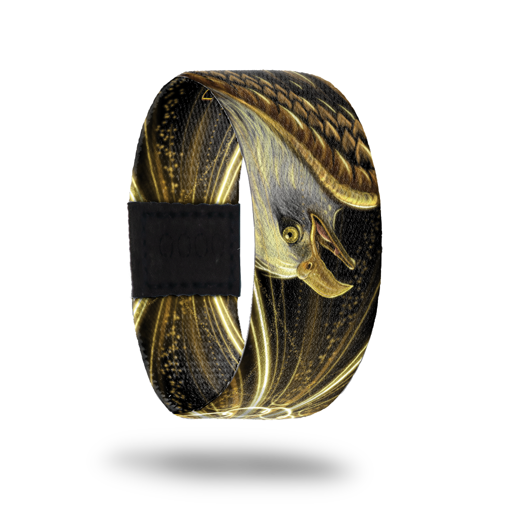 Outside design of Let Freedom Ring. Realistic drawn image of a bald eagle in the colors of white and gold with a gold and black background