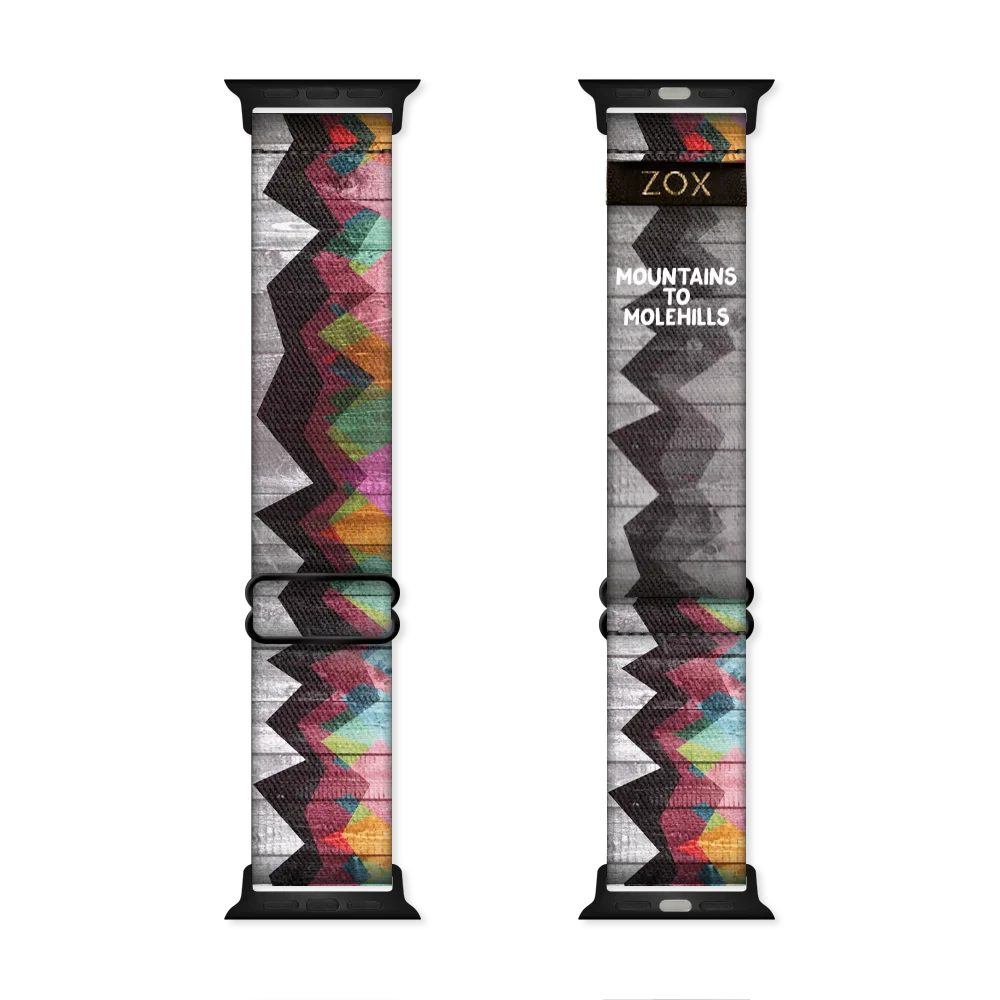 Watchband with two design in one. The background design is a black and grey weathered picket fence and has a grainy look to it. Over top about 3/4 showing, is abstract mountains of varying colors. The inside is the same design and reads Mountains to Molehills. Check out the size giude for compatible watches. 