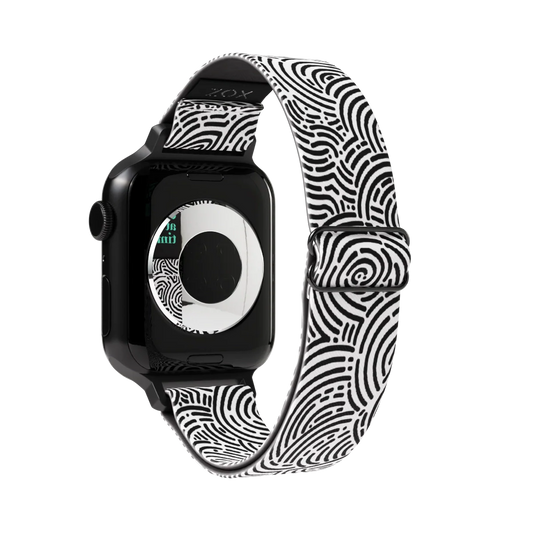 Watchband outside is black and white maze swirls all over. 