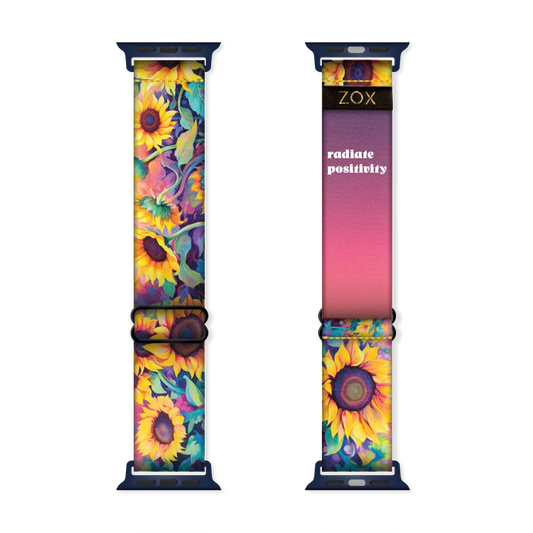 Watchband with very bright and neon sunflowers with vines of blue, purple, pink. The inside is purple to yellow gradient and reads Radiate Positivity.