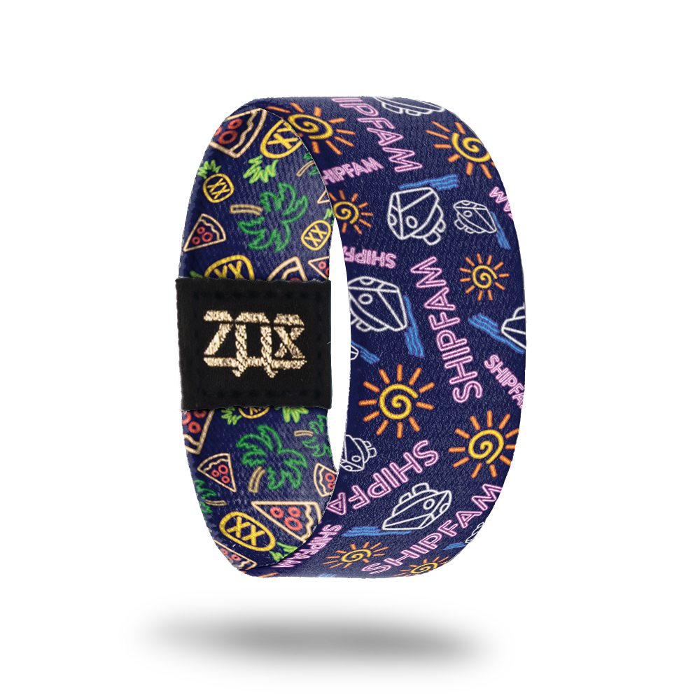 Product photo of the inside of ShipFam: navy blue design with repeating neon light sign suns, cruise ships, pink 'Shipfam' text