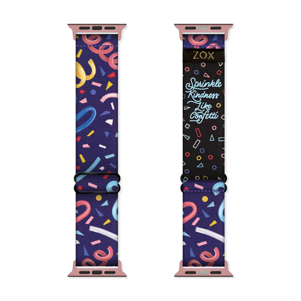 Dark blue watchband with multicolored streamers and confetti. The inside is the same and reads Sprinkle Kindness Like Confetti. 