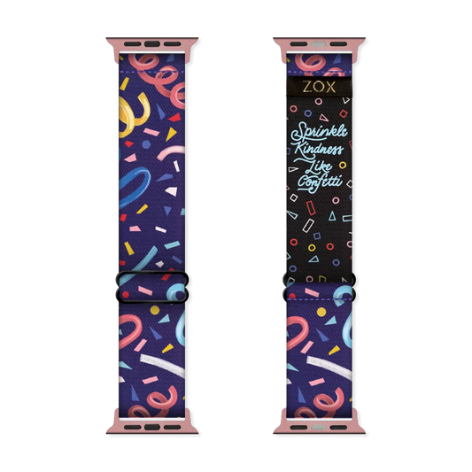 Dark blue watchband with multicolored streamers and confetti. The inside is the same and reads Sprinkle Kindness Like Confetti. 