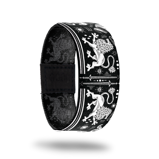 Outside Design of Stay the Course: black design with white lions, swords, diamonds and gems, suns, and knights on horses