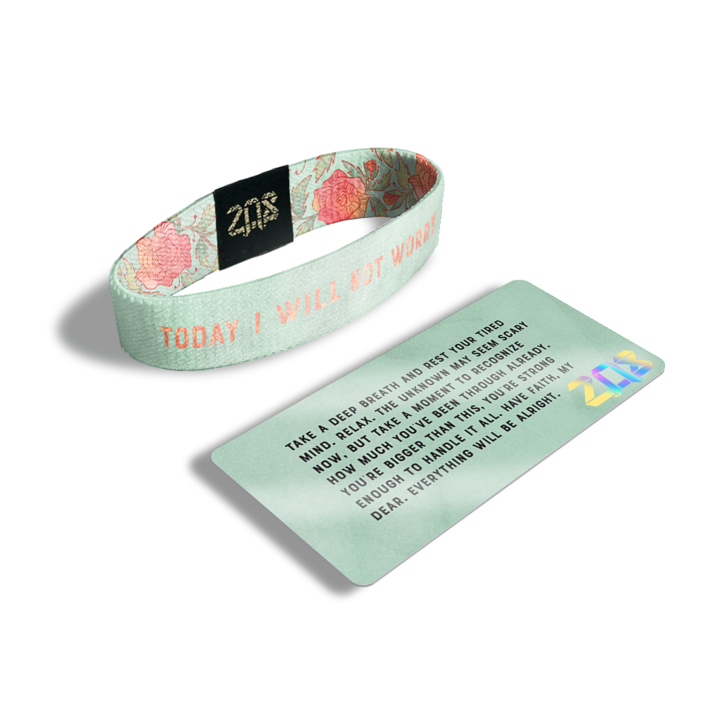 Inside Design of Today I Will Not Worry: light green design with watercolor rose-colored text ‘Today I Will Not Worry’ with its card saying ‘Take a deep breath and rest your tired mind. Relax. The unknown may seem scary now, but take a moment to recognize how much you’ve been through already. You’re bigger than this, you’re strong enough to handle it all. Have faith, my dear. Everything will be alright.’