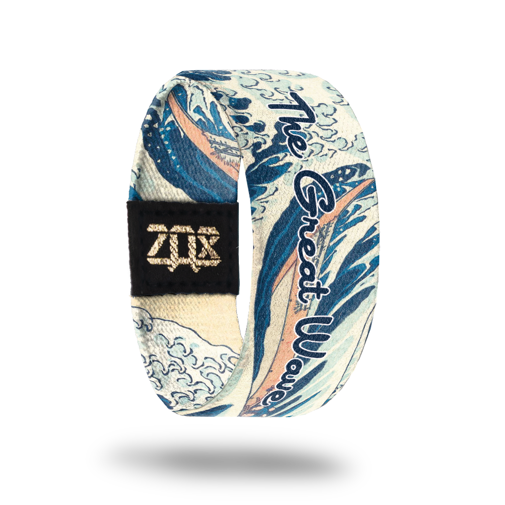 Inside Design of The Great Wave: shows the water of the classic The Great Wave painting by Katsushika Hokusai with white and dark blue text ‘The Great Wave’
