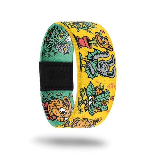 Outside design for Wild Life. Yellow background with illustrated animals and plants in artist Killer Acid's style