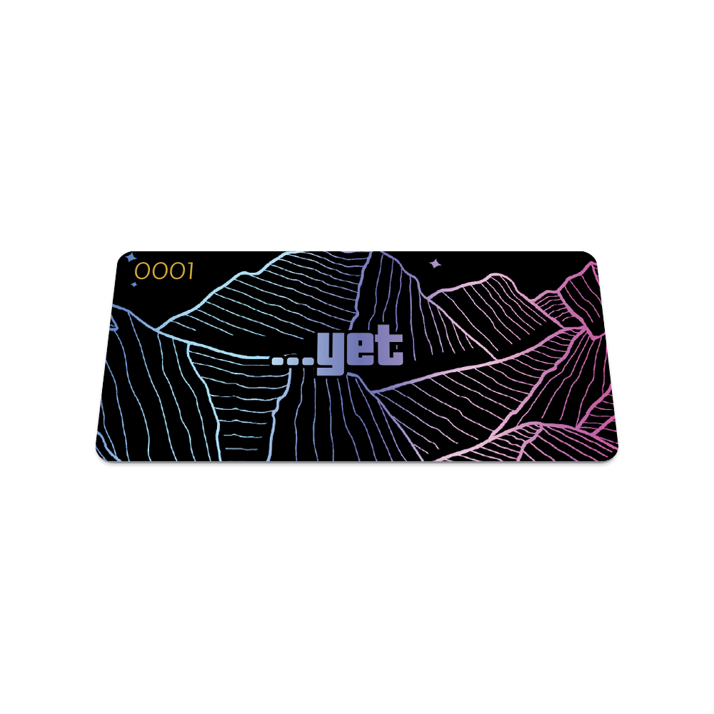Product photo of the front of the ...yet card: black design with neon blue, purple, and pink mountains with neon blue to purple '...yet' text 