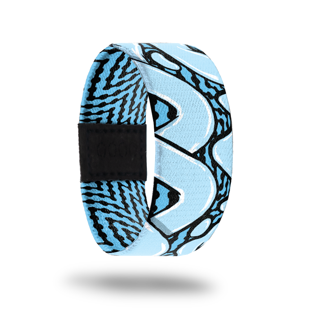Outside design for You and Me. Blue background with black zig-zag lines and large light blue loop lines over the background