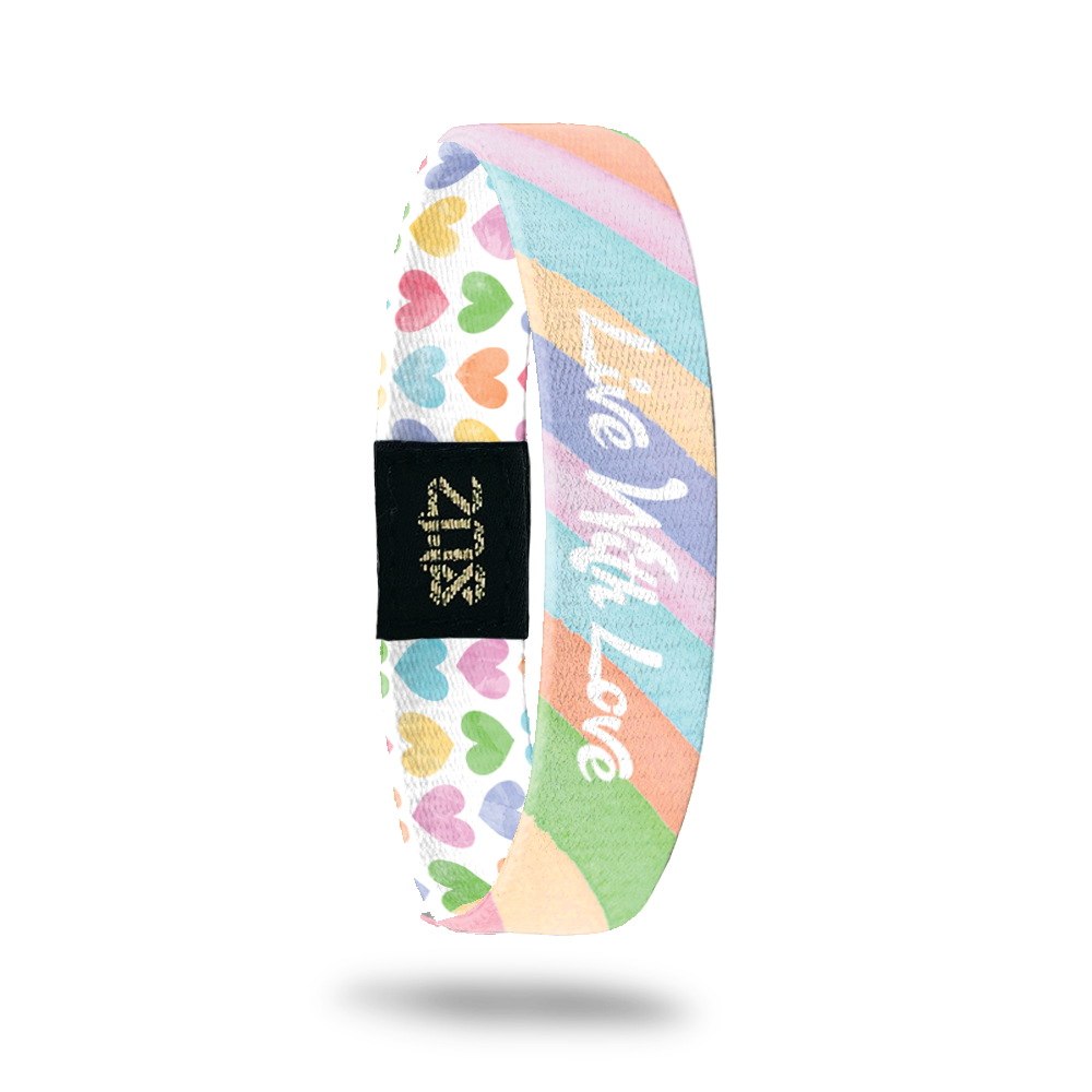 Product photo of inside design with italic white text live with love overlaying a pastel orange, yellow, pink, green, purple, and blue striped background