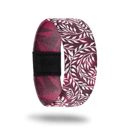 Outside design of Hope Over Fear. Red background with illustrated leafy vines across the design