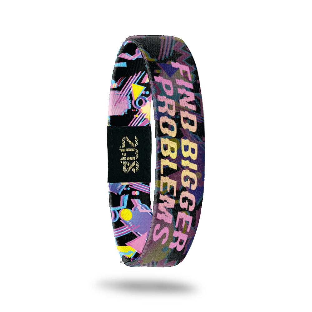 Product photo of inside design with bold text find bigger problems in a pink to yellow gradient with transparent neon geometric designs overlaying a black background