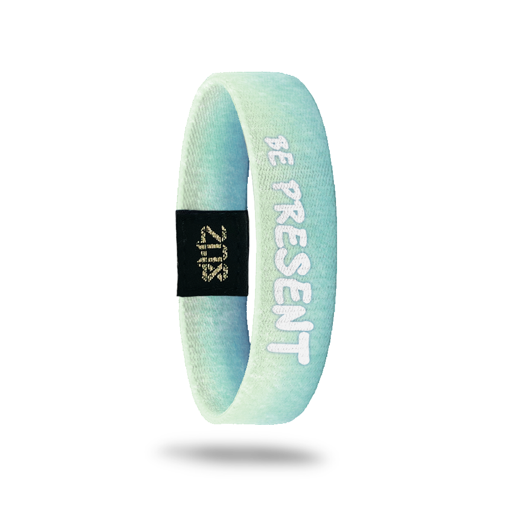 Inside Design of Be Present: gradient from medium-light blue to light blue with white text overlaying ‘Be Present’