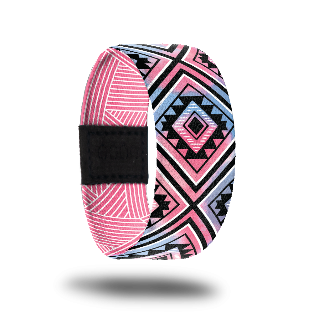 Outside design of Break Away, blended background with pink and blue with black lines and square geometric shapes