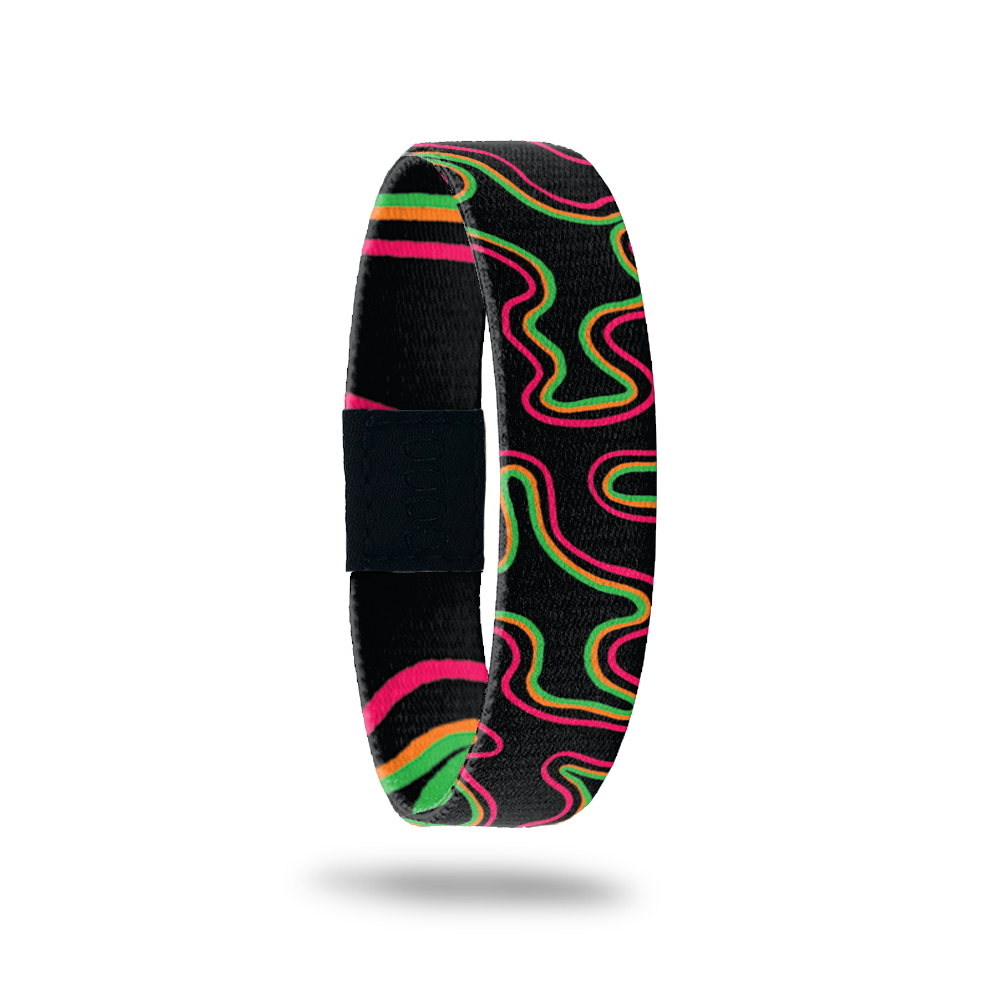 Inside Design of Dare to Be Different: black background with pink, orange and green in irregular shapes throughout the single