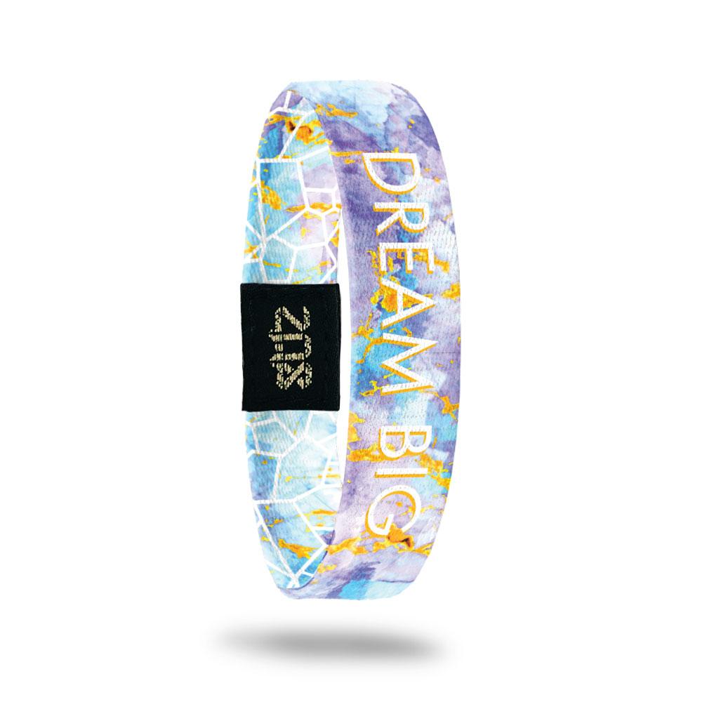 Product photo of inside design with dream big in bold text with blue, purple, and yellow watercolored background