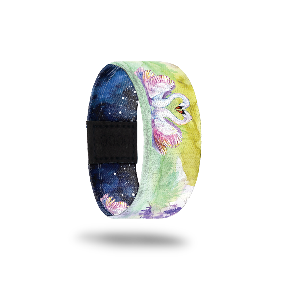 Outside Design of Even When We’re Far Apart kids size: watercolor pond with two swans facing each other and forming a heart with their necks